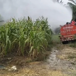 Polsek Pangkalan Kuras Siram 12 Hektare Lahan Jagung Cegah Gagal Panen Akibat Kekeringan